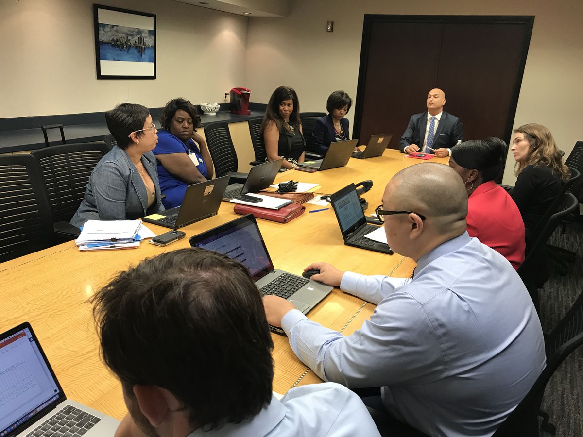 Detroit schools Superintendent Nikolai Vitti leads a meeting of advisers in a conference room adjacent to his office in Detroit’s Fisher Building in August 2017.