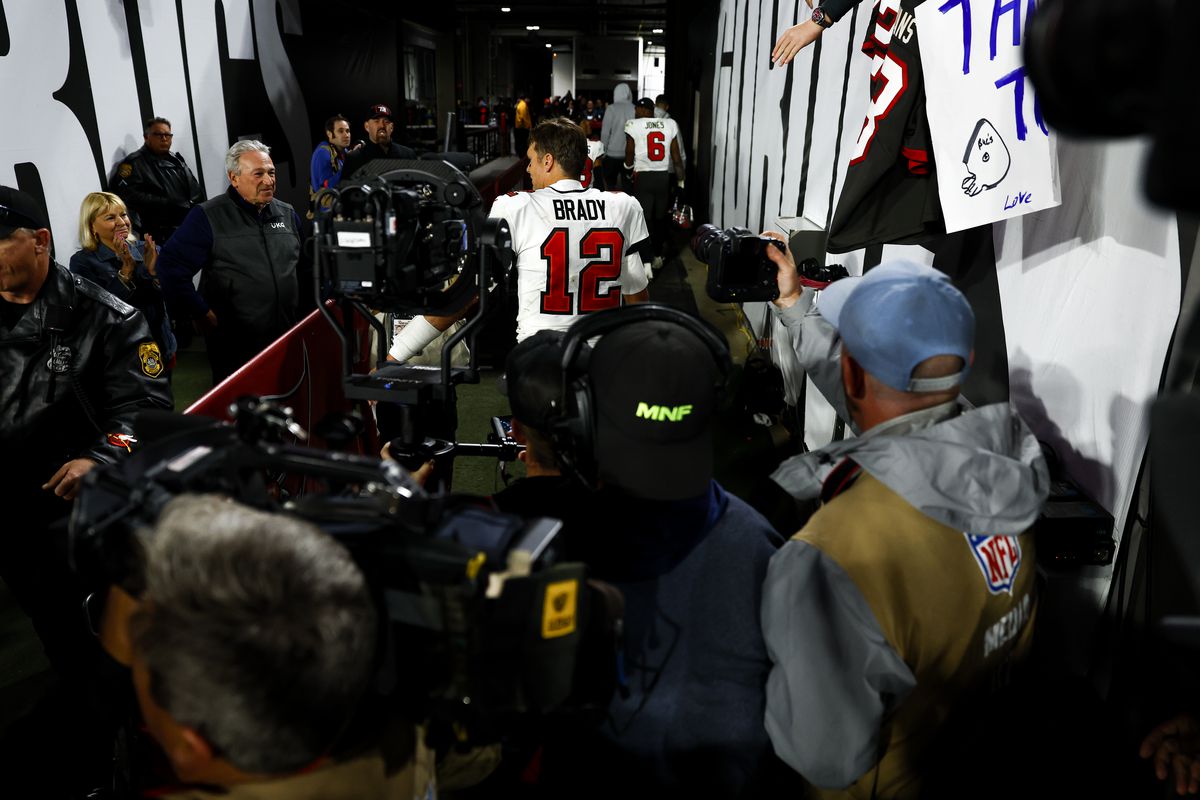 Tom Brady #12 of the Tampa Bay Buccaneers exits the field through the tunnel after an NFL wild card playoff football game against the Dallas Cowboys at Raymond James Stadium on January 16, 2023 in Tampa, Florida.