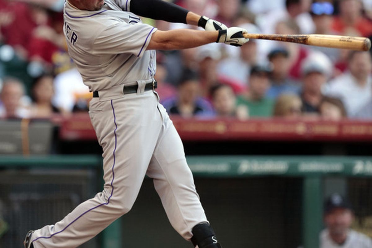 April 7, 2012; Houston, TX, USA; Colorado Rockies right fielder Michael Cuddyer (3) hits a double against the Houston Astros during the second inning at Minute Maid Park. Mandatory Credit: Thomas Campbell-US PRESSWIRE