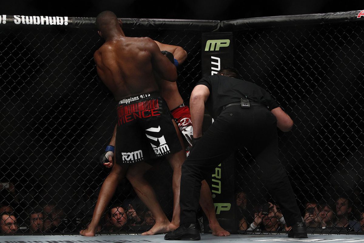 Jon Jones secures a guillotine choke on Lyoto Machida at UFC 140 on Saturday, Dec. 10, 2011 at the Air Canada Centre in Toronto, Canada. Esther Lin, MMA Fighting