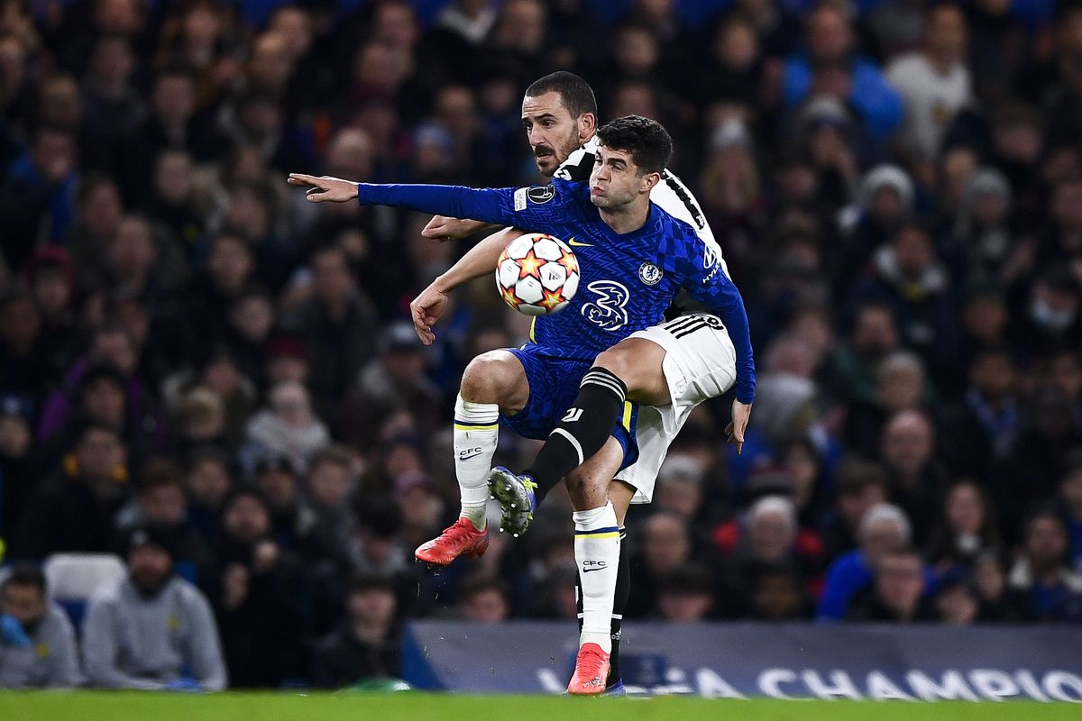 Christian Pulisic of Chelsea FC competes for the ball with...