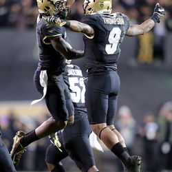 Colorado Buffaloes celebrate a touchdown during a football game against the Utah Utes at Folsom Field in Boulder, Colo., on Saturday, Nov. 26, 2016. Utah lost 22-27.