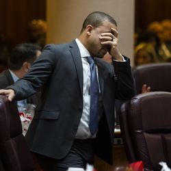 Ald. Michael Scott Jr. (24th) holds his head during a contentious Chicago City Council meeting, where aldermen were scheduled to vote on attempt by the Black Caucus to delay sales of recreational marijuana in Chicago for six months to give African American and Hispanic people a chance to get a piece of the action, at City Hall, Wednesday, Dec. 18, 2019.