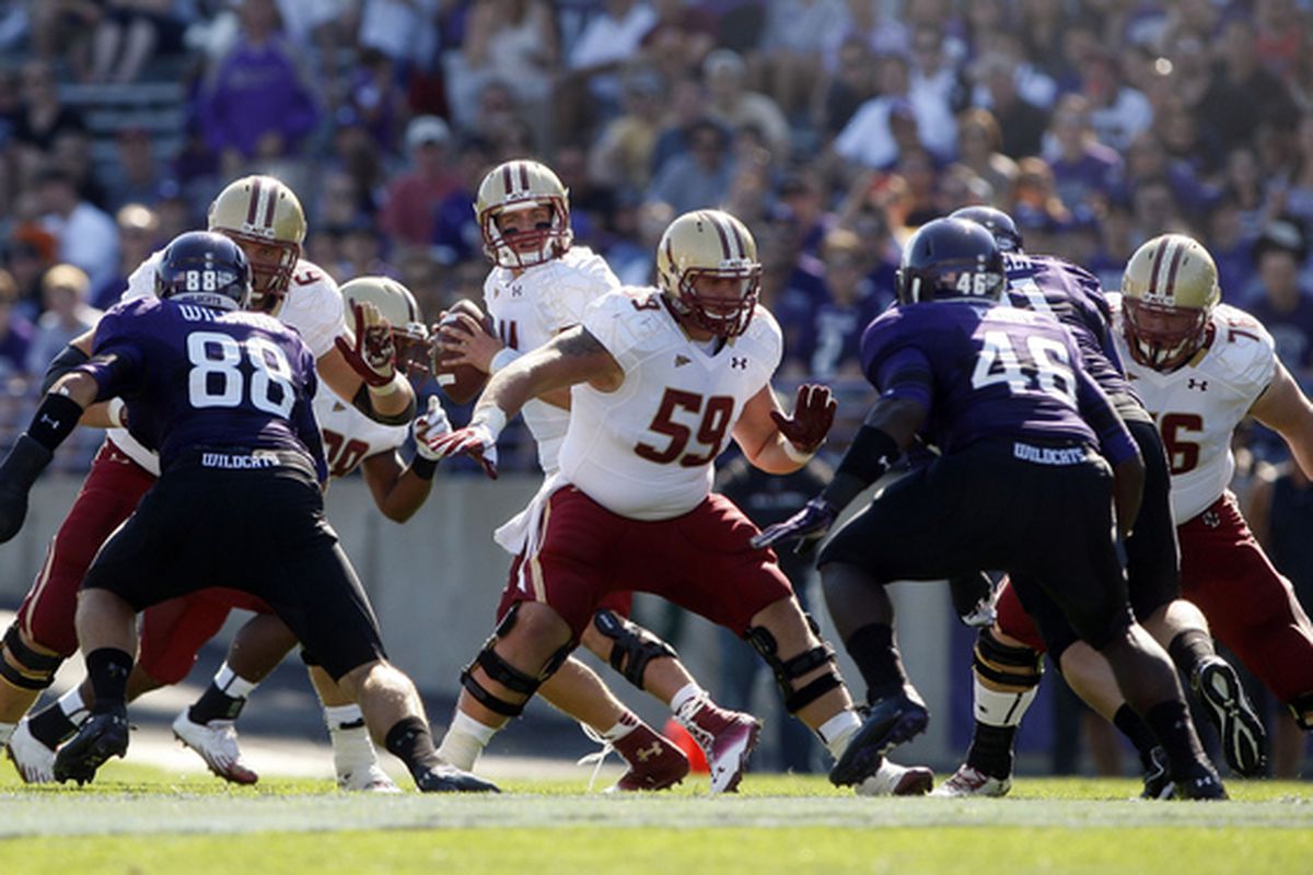 Sep 15, 2012; Evanston, IL, USA; Boston College Eagles quarterback Chase Rettig (11) drops back to pass against the Northwestern Wildcats during the first quarter at Ryan Field. Jerry Lai-US PRESSWIRE