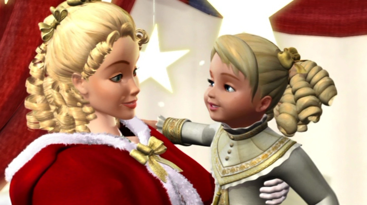 Barbie with her blonde hair in Victorian ringlets, holding a small blonde. Barbie wears a red cape trimmed with white fur.