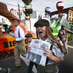 “Extra! Extra!” shouts a participant with the West Jordan Welby Stake float, winner of the Ensign Award, during the Days of ’47 Parade in Salt Lake City on Wednesday, July 24, 2019.