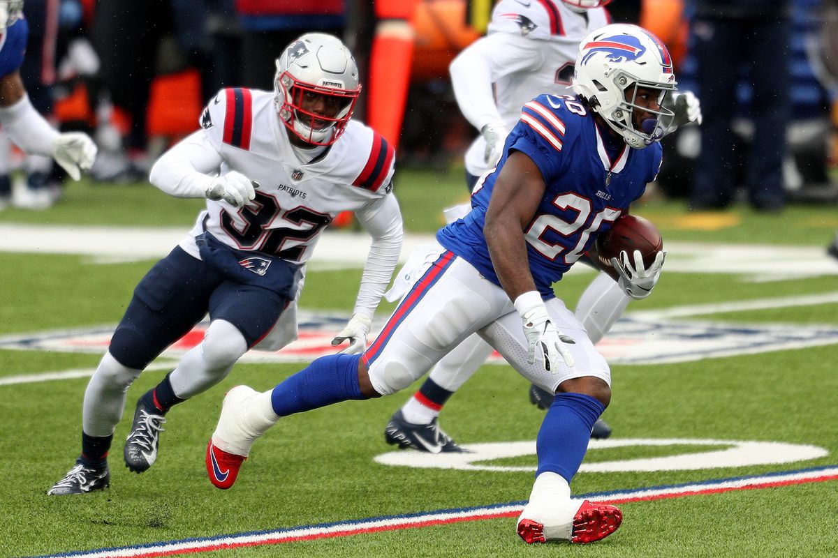Zack Moss #20 of the Buffalo Bills rushes during a game against the New England Patriots against the New England Patriots at Bills Stadium on November 01, 2020 in Orchard Park, New York.