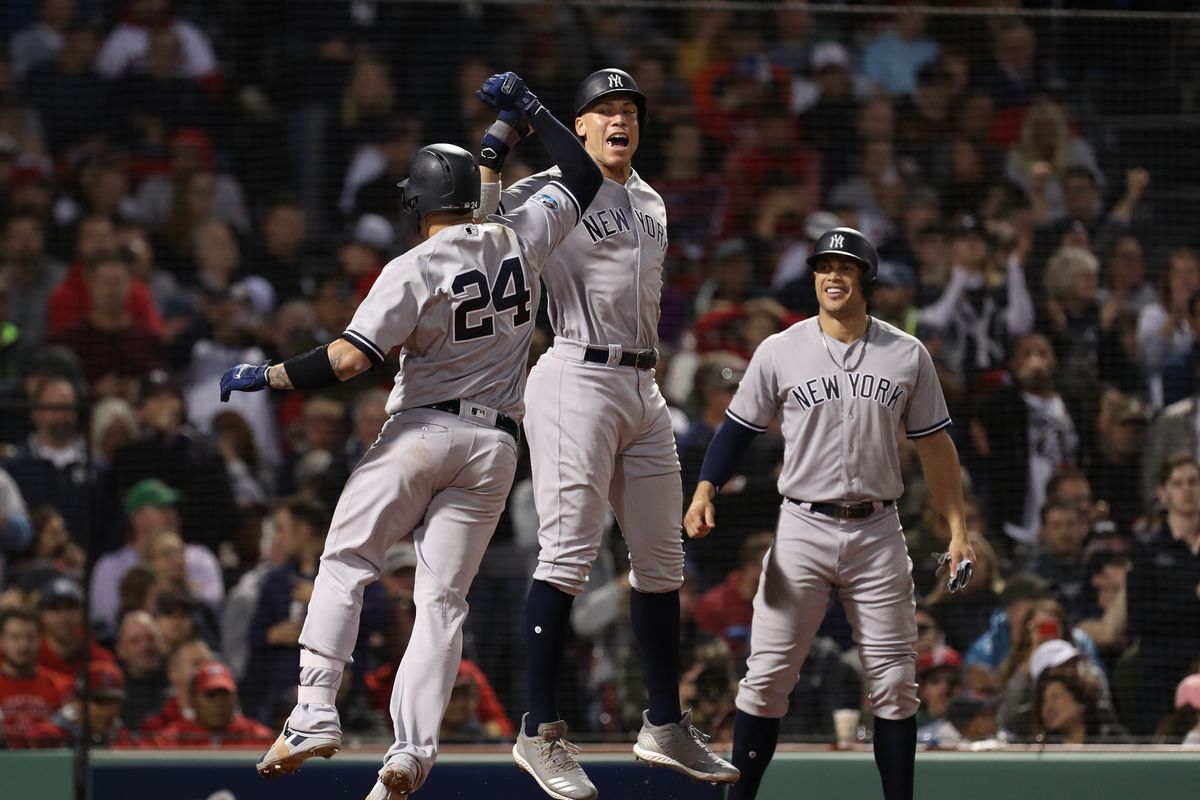 Yankees catcher Gary Sanchez celebrates with Aaron Judge after hitting a three-run homer during ALDS Game Two at Fenway Park.