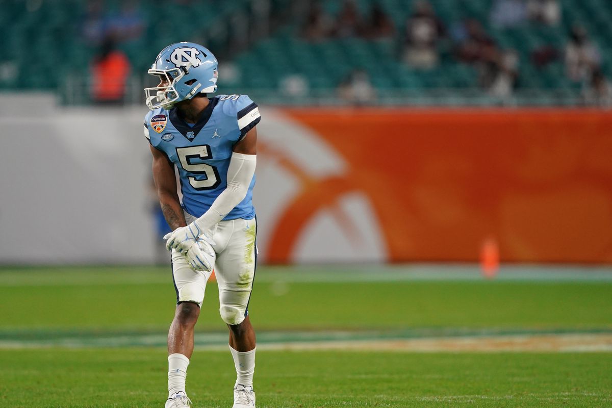 Dazz Newsome #5 of the North Carolina Tar Heels lines up against the Texas A&amp;M Aggies during the first half of the Capital One Orange Bowl at Hard Rock Stadium on January 02, 2021 in Miami Gardens, Florida.