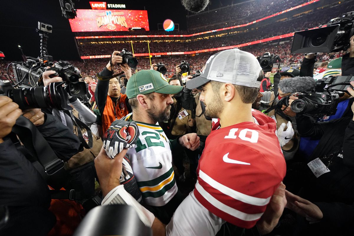 Green Bay Packers quarterback Aaron Rodgers (12) greets San Francisco 49ers quarterback Jimmy Garoppolo (10) after the NFC Championship Game at Levi’s Stadium.
