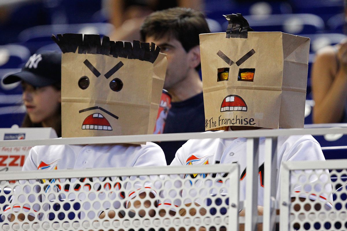 My friend and I will not be attending in these paper bag masks, but we are doing it without a penny going to Jeffrey Loria.