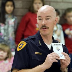 Salt Lake Police Chief Chris Burbank discusses the Child ID Kits that will be distributed to all Salt Lake City School District elementary schools, during a press conference at Washington Elementary School, November 16, 2009 in Salt Lake City.