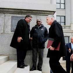 Evangelist Franklin Graham passes the Rev. France Davis of Calvary Baptist Church as he enters the Decision America Tour at the Capitol in Salt Lake City on Tuesday, March 29, 2016. The focus of the prayer rally — which is traveling to all 50 states — is to challenge Christians to pray for the United States and its leaders, and to live and promote biblical principles at home, in public and at the ballot box.