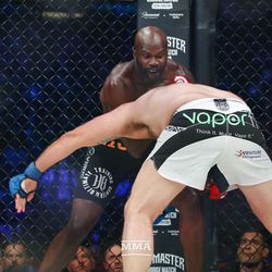 Cheick Kongo stops a takedown from Tim Johnson at Bellator 208 at the Nassau Coliseum in Uniondale, N.Y.