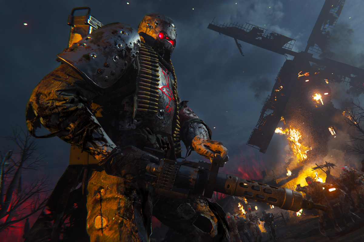 A tank Zombie with a machine gun stands by a burning windmill in Call of Duty: Vanguard