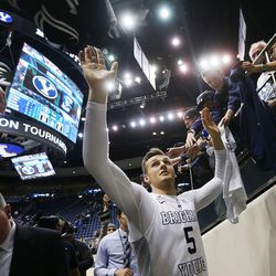 Brigham Young Cougars guard Kyle Collinsworth (5) exits the floor after the Cougars defeated Creighton 88-82 in NIT quarterfinal action at the Marriott Center in Provo Tuesday, March 22, 2016.