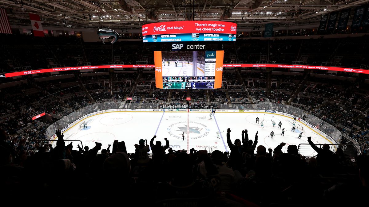 A general view of the fans cheering after the San Jose Sharks scored a goal against the Vancouver Canucks in the third period at SAP Center on December 07, 2022 in San Jose, California.