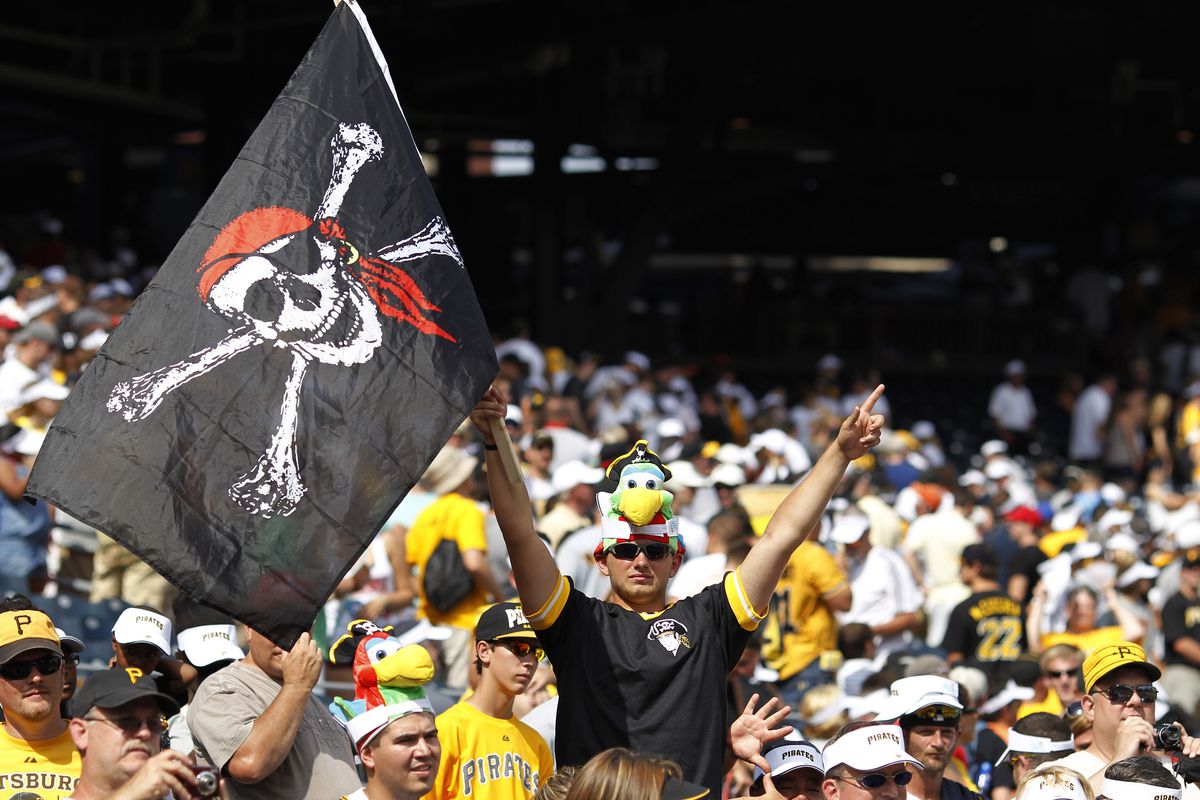 PITTSBURGH, PA - JULY 22: Pittsburgh Pirates fans celebrate after the game against the Miami Marlins at PNC Park on July 22, 2012 in Pittsburgh, Pennsylvania. The Pirates won 3-0. (Photo by Joe Robbins/Getty Images)