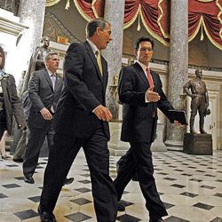 Minority Leader John Boehner of Ohio, left, and Minority Whip Eric Cantor of Virgina lead Republican lawmakers onto the House floor as the House prepares to vote on health care reform in the U.S. Capitol in Washington Sunday.
