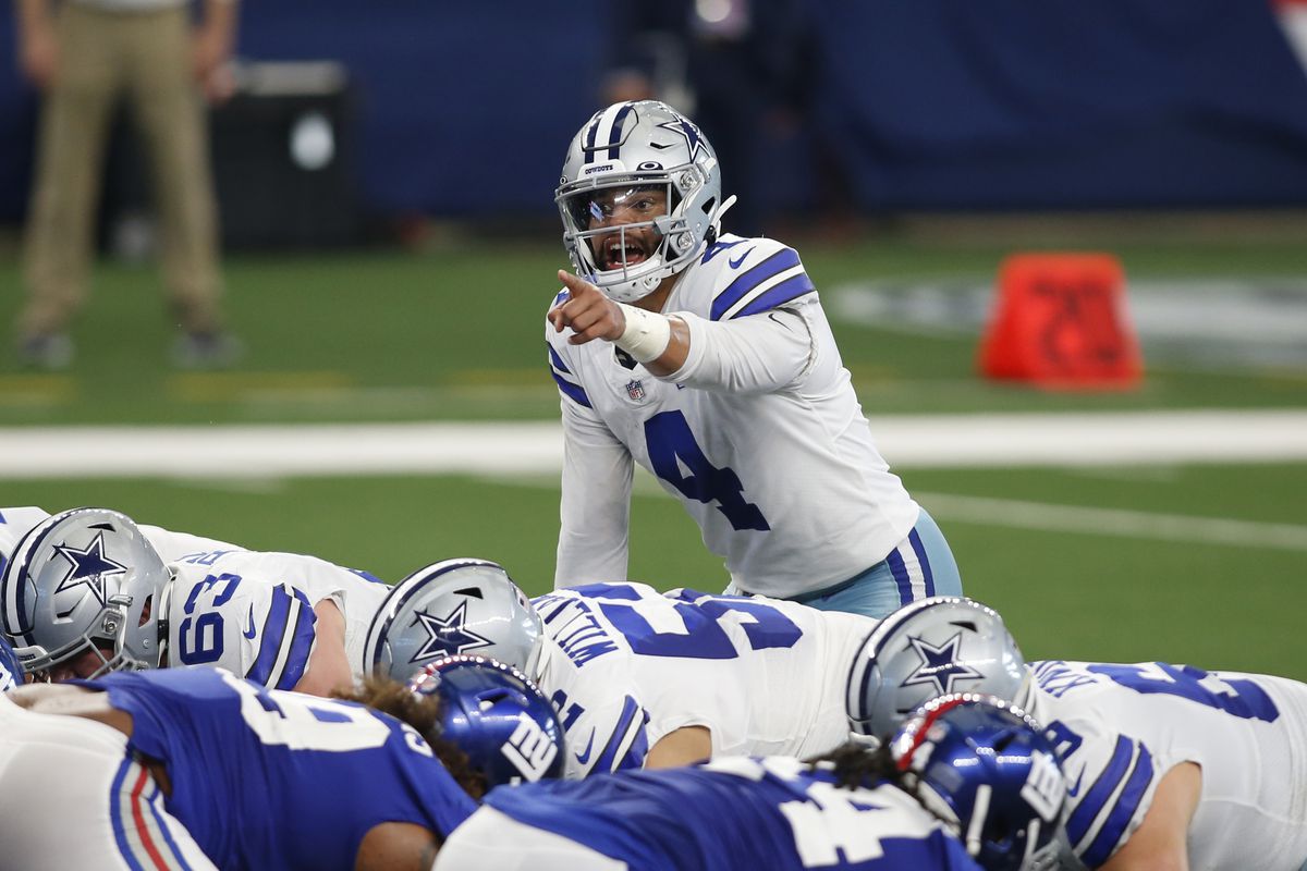 Dallas Cowboys quarterback Dak Prescott (4) calls a play in the second quarter against the New York Giants at AT&amp;T Stadium.