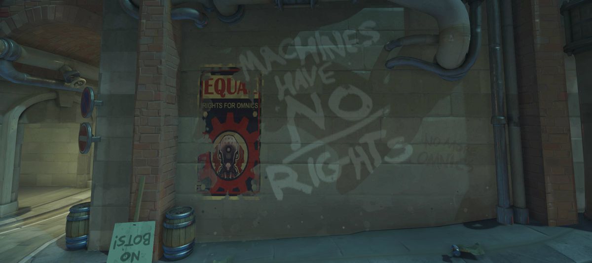 Overwatch - White graffiti reading “Machines have NO rights!” on a stone wall in King’s Row