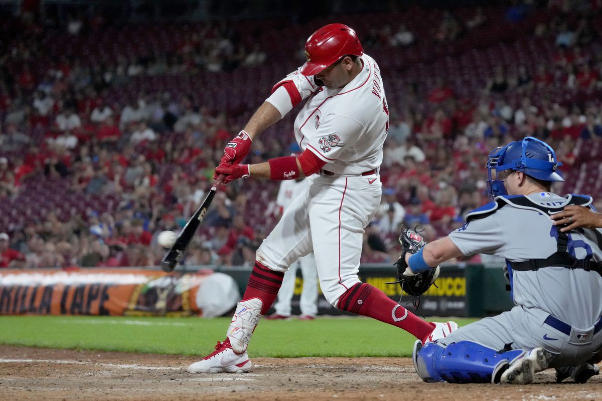 Joey Votto #19 of the Cincinnati Reds hits a single in the ninth inning against the Los Angeles Dodgers at Great American Ball Park on June 21, 2022 in Cincinnati, Ohio. The hit was his 1,000th career hit at Great American Ball Park.