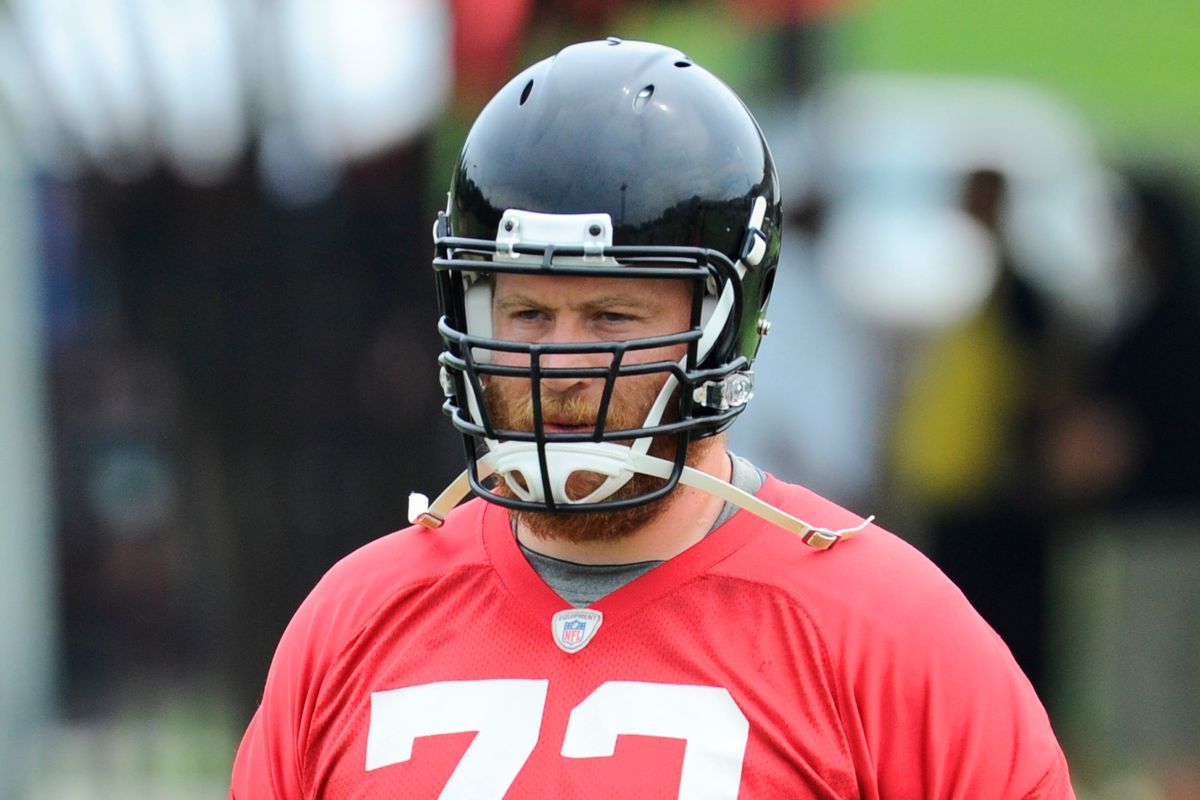 Sam Baker sure looks unhappy for a guy who is basically stealing from the Falcons.