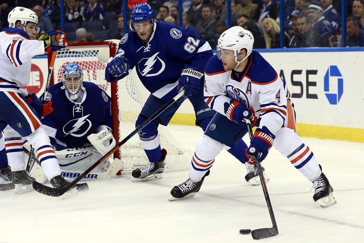 Tampa Bay's Andrej Sustr defends against Edmonton's Taylor Hall in the Lightning's 6-4 win Tuesday in Tampa