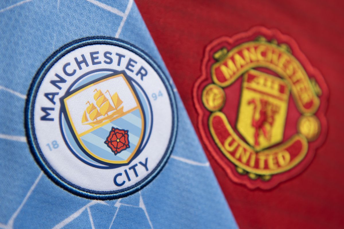 The Manchester City and Manchester United Club Badges