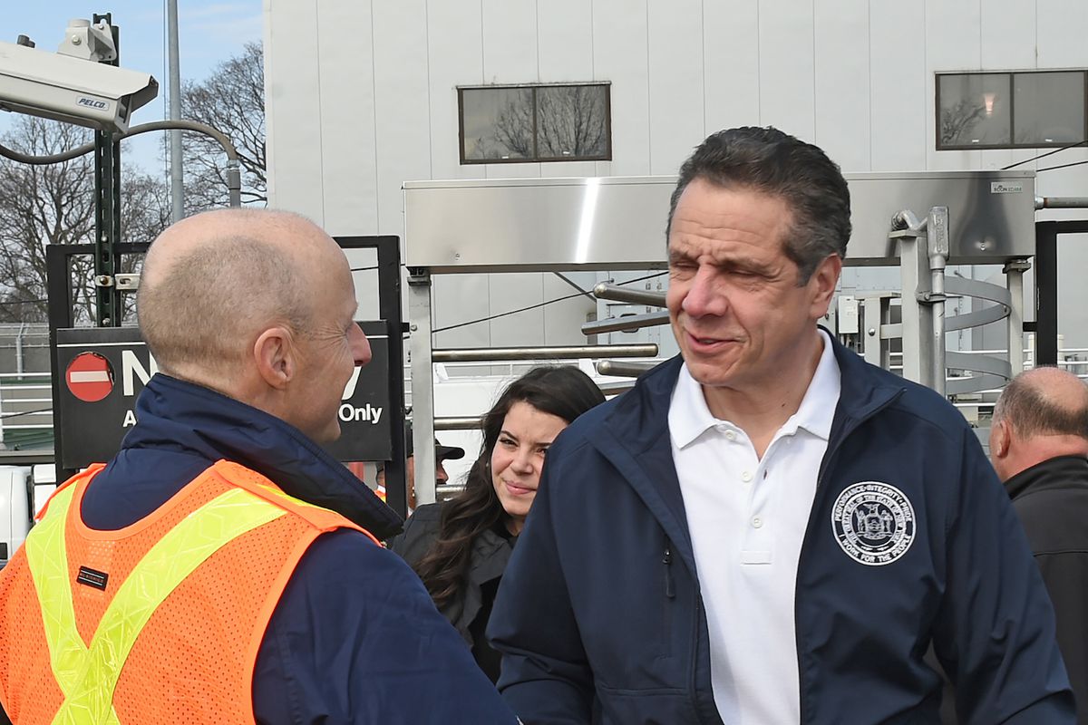 Governor Cuomo shakes hands with then-NYCTA President Andy Byford during a Brooklyn subway station opening, April 12, 2018.