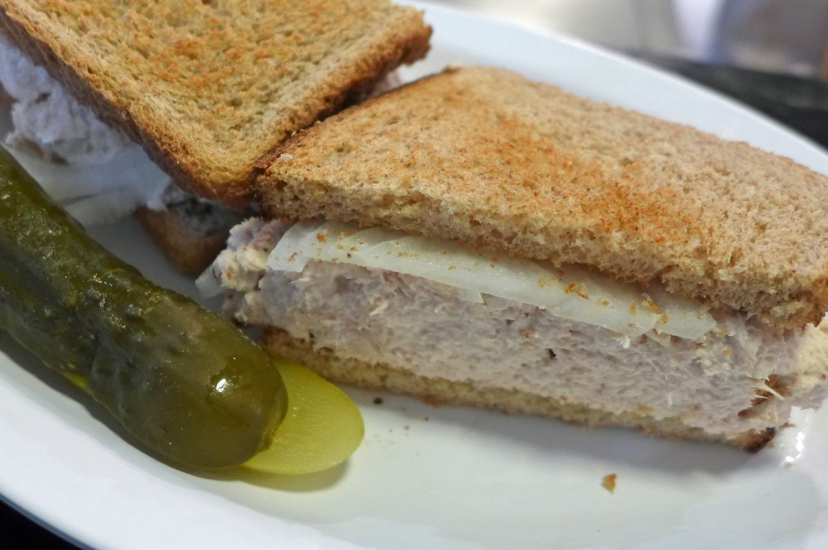 Eisenberg’s tuna salad sandwich has lots of thick tuna piled onto wheat bread. There’s a pickle on the side.
