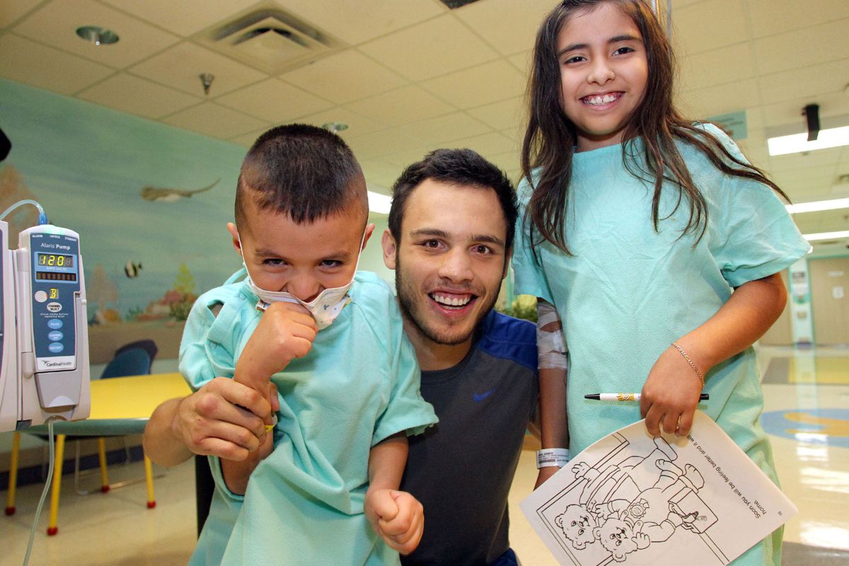 Julio Cesar Chavez Jr visited a children's hospital in El Paso on Tuesday, four days ahead of his big fight with Andy Lee. (Photo by Chris Farina/Top Rank)