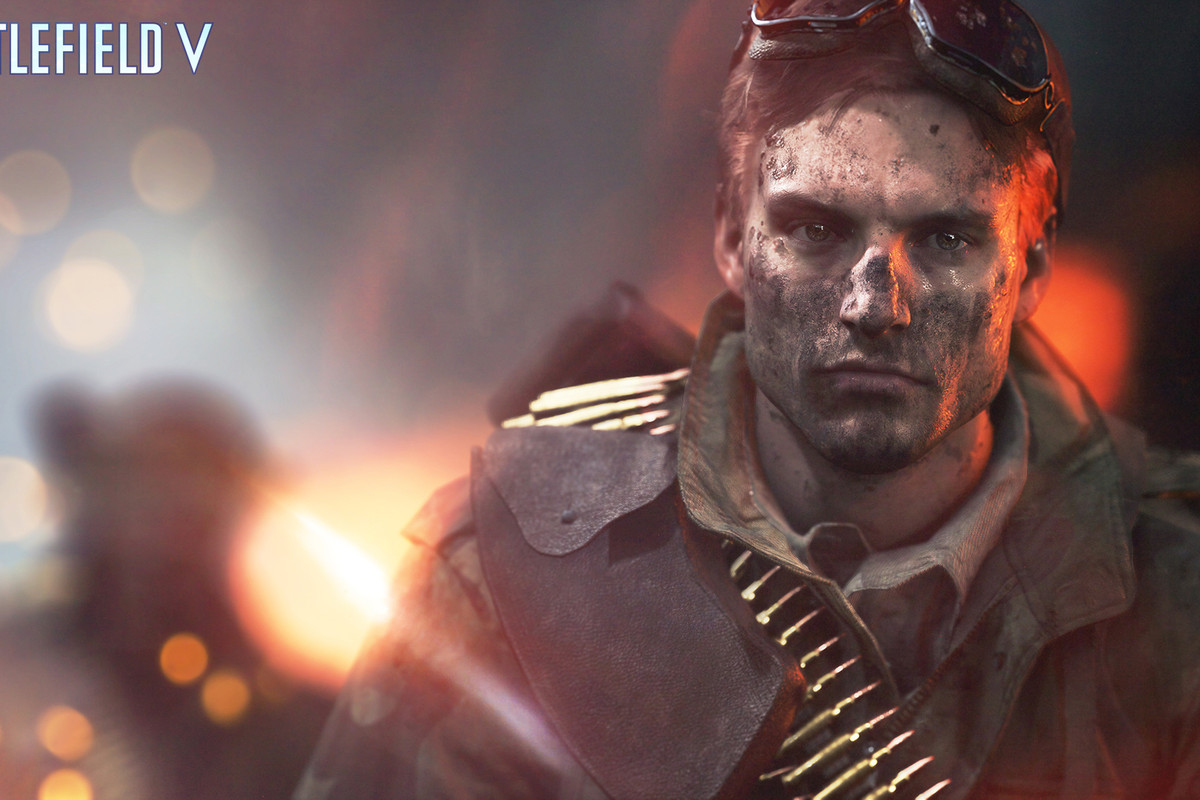 A dirty man with goggles raised walks toward the camera in key art for Battlefield 5.