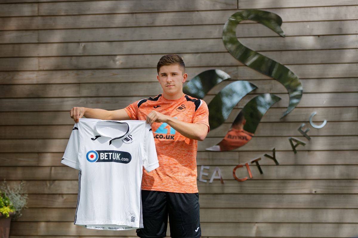 Swansea City Unveil New Signing Declan John
