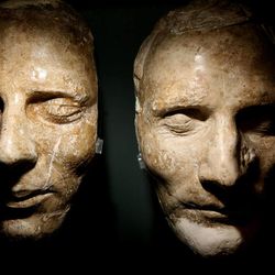 The original plaster death masks of Joseph and Hyrum Smith on display at the Church History Museum in 2009.