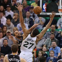 San Antonio Spurs guard Manu Ginobili (20) tries to get by Utah Jazz center Rudy Gobert (27) as the Utah Jazz play the San Antonio Spurs in NBA basketball Monday, Feb. 23, 2015, in Salt Lake City.  
