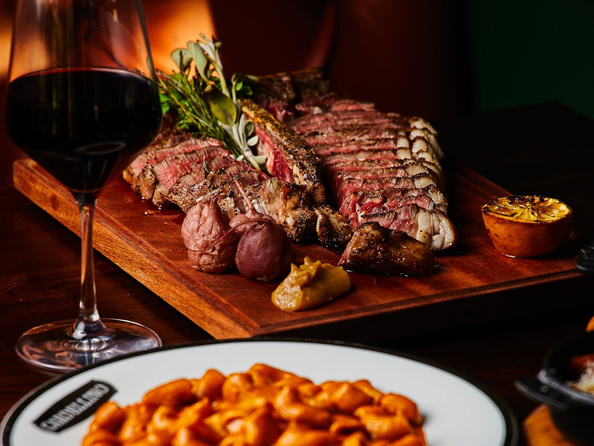 Bistecca Fiorentina and pasta dish from the Tuscan Experience