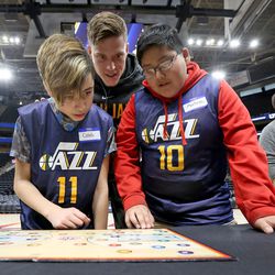 Jazz forward Jonas Jerebko plays NBA Math Hoops with students at the Vivint Smart Home Arena in Salt Lake City on Monday, Jan. 29, 2018.