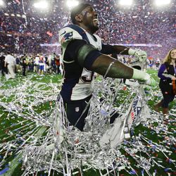 New England Patriots defensive end Chandler Jones (95) celebrates after the NFL Super Bowl XLIX football game  against the Seattle Seahawks Sunday, Feb. 1, 2015, in Glendale, Ariz. The Patriots won the game 28-24.