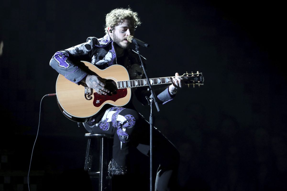 Post Malone performs a medley at the 61st annual Grammy Awards on Sunday, Feb. 10, 2019, in Los Angeles.
