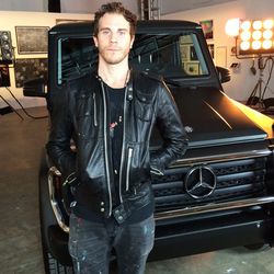 Artist Gregory Siff in front of the Mercedes-Benz G550 that he's hand-painting for the auction.