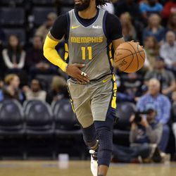 Memphis Grizzlies guard Mike Conley (11) brings the ball up court in the second half of an NBA basketball game against the New Orleans Pelicans Saturday, Feb. 9, 2019, in Memphis, Tenn.