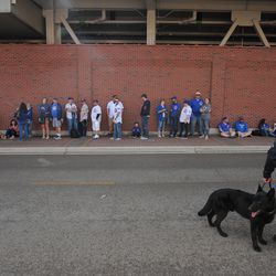 Chicago Cubs Fans wait in line for the gates to open outside Wrigley Field. | Victor Hilitski/For the Sun-Times