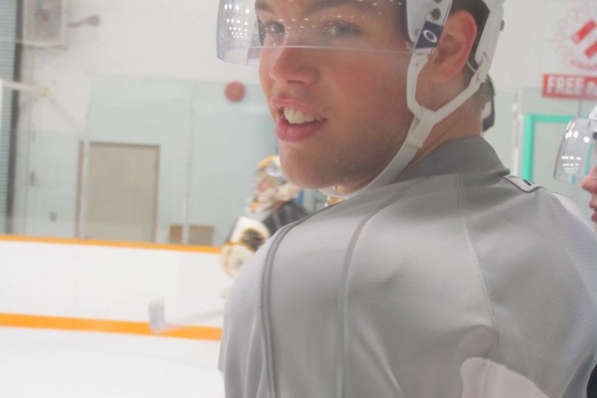 Taylor Hall smiles for the camera while waiting his turn at the recent Oiler summer development camp. (Photo: Lisa McRitchie)