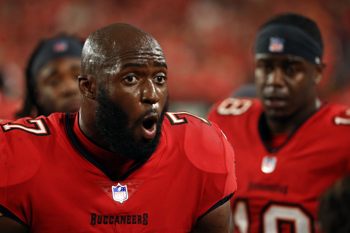 &nbsp;Leonard Fournette #7 of the Tampa Bay Buccaneers talks on the sidelines during the 2nd quarter of the game against the New Orleans Saints at Raymond James Stadium on December 19, 2021 in Tampa, Florida.