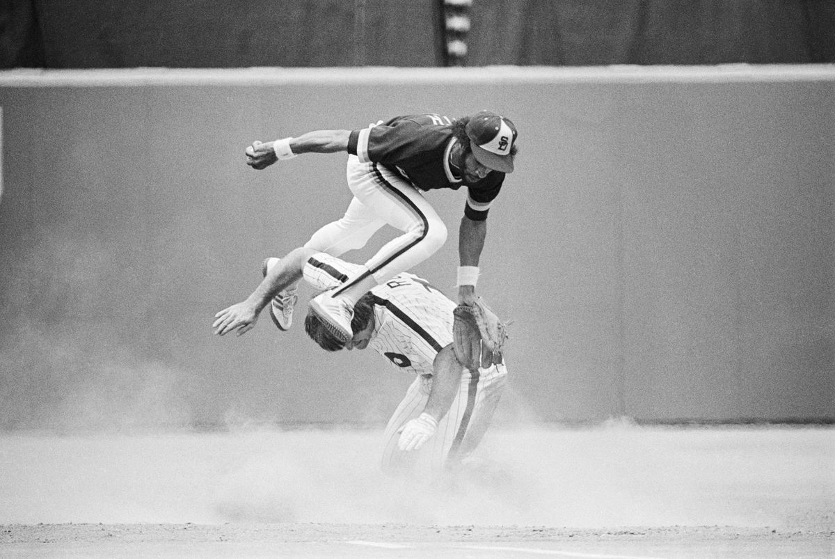 Ozzie Smith Jumping over Pete Rose