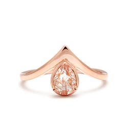 Celestine Orbit Ring in rose gold and copper rutilated quartz