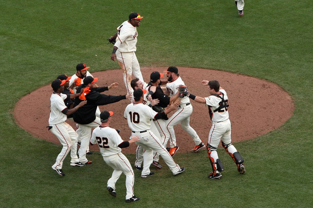 SAN FRANCISCO - OCTOBER 03:  The San Francisco Giants celebrate after they beat the San Diego Padres to win the National League West Title at AT&T Park on October 3 2010 in San Francisco California.  (Photo by Ezra Shaw/Getty Images)