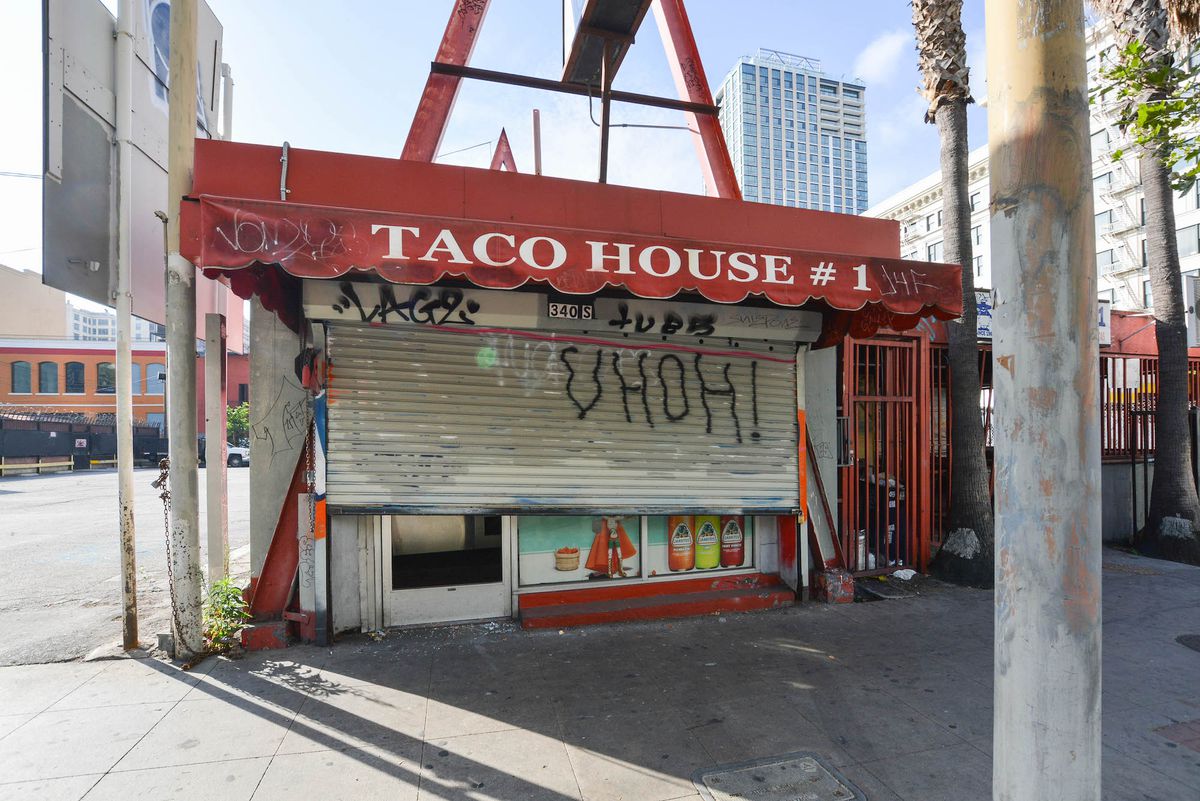 A taco restaurant had its metal roll up door broken into during a night of protests.