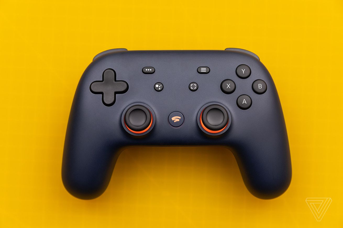 A picture showing the blue and orange Google Stadia wireless controller.